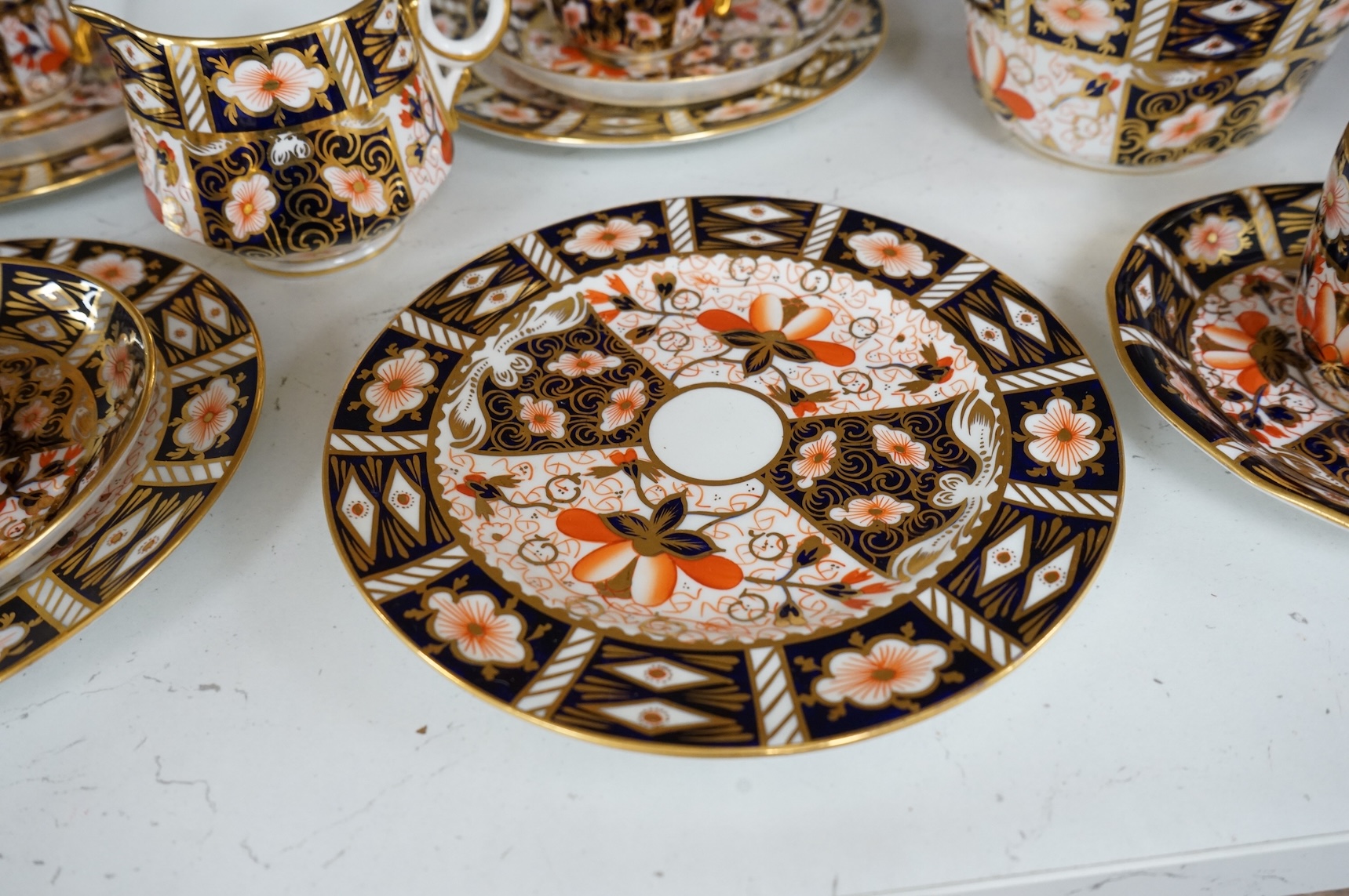 A Royal Crown Derby Imari pattern part tea service to include trios, bowl and jug